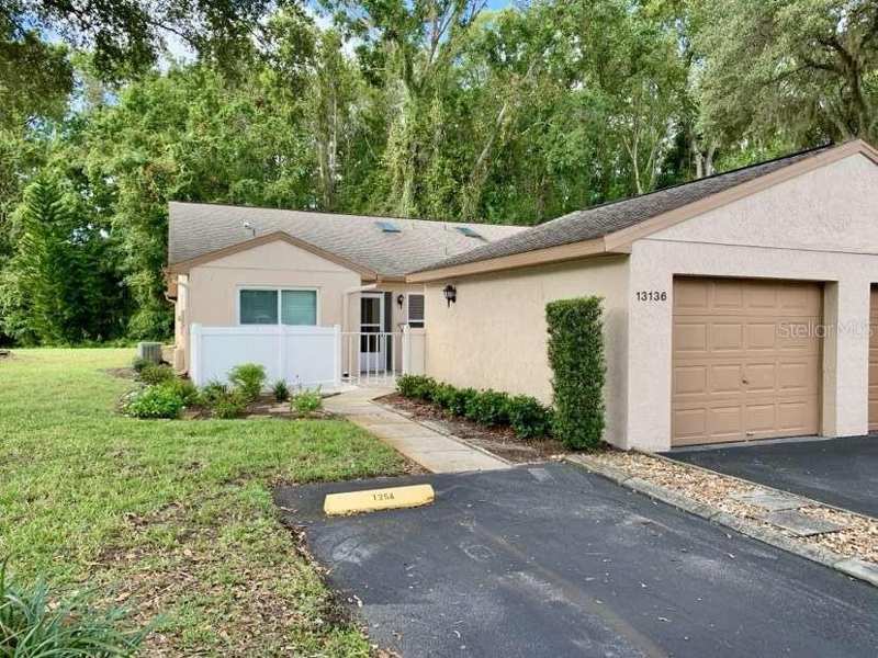 2 bedroom Condominium at 13136 Cypress Hill Drive #125A, Pine Rdg Sugar Crk Village 1 1, Hudson — photo 1