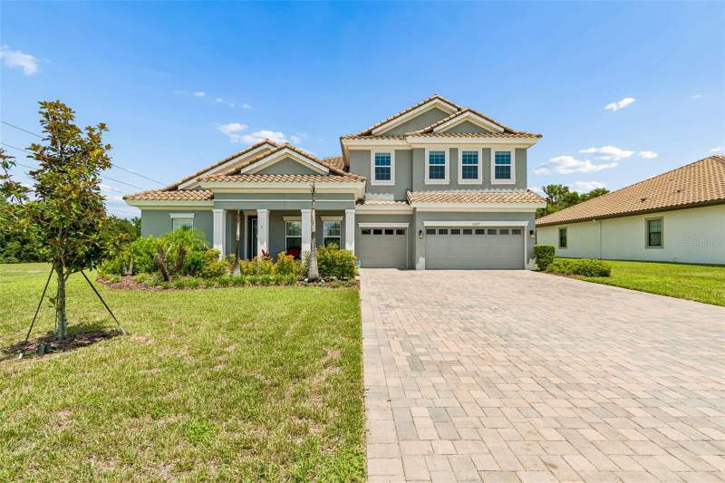 5 bedroom Single Family Residence at 10597 Meadowrun Drive, Creek Ridge Preserve Phase 1 Lot 13 Block E, Lithia — photo 2