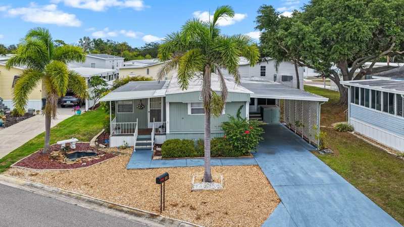 2 bedroom Manufactured Home at 123 Saint Kitts Way, Caribbean Isles Residential Cooperative, Apollo Beach — photo 1