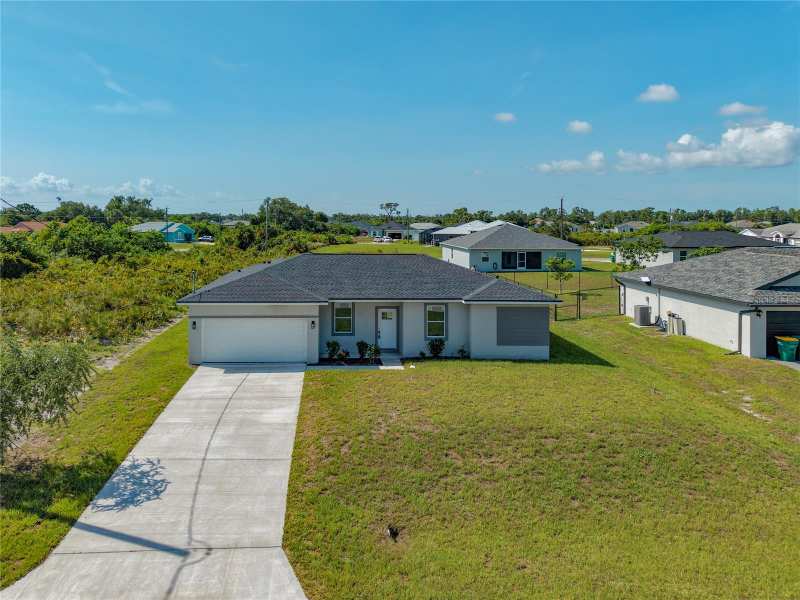 4 bedroom Single Family Residence at 12219 Bacchus Road, Port Charlotte Sec 056, Port Charlotte — photo 1