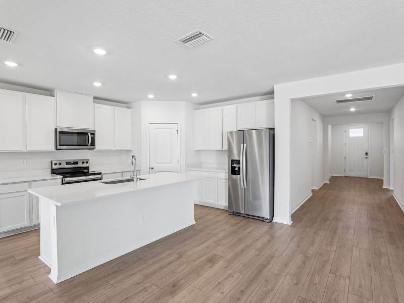 4 bedroom Single Family Residence at 14145 Harvest Pines Lane, Pine Ridge Meadows, Hudson — photo 4
