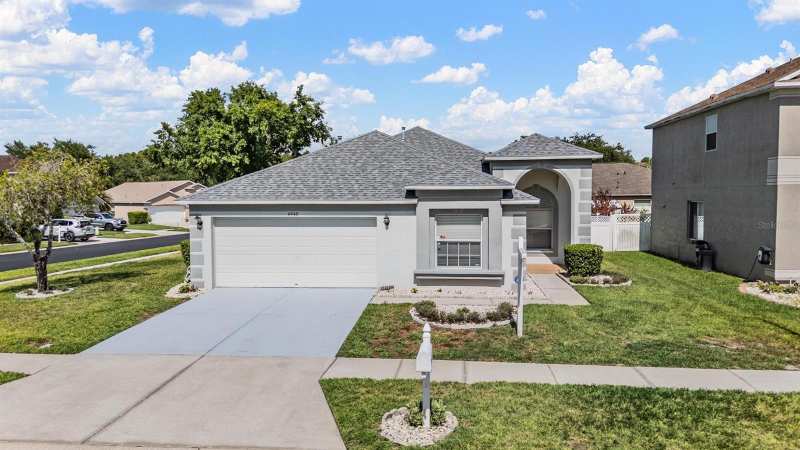 4 bedroom Single Family Residence at 4940 Woodmere Road, Grand Oaks Ph 02 Unit 01 02, Land O Lakes — photo 1