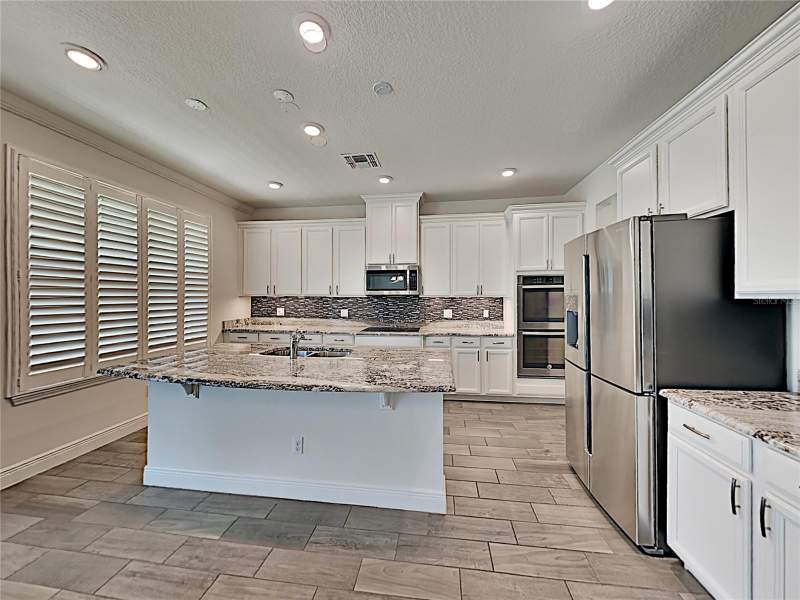 5 bedroom Single Family Residence at 8931 Lookout Pointe Drive, Windermere Trls Ph 4B, Windermere — photo 5
