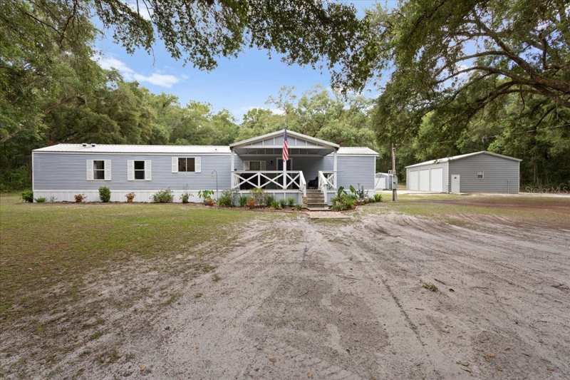 2 bedroom Manufactured Home at 16221 SW 67th Place, Archer, Archer — photo 1