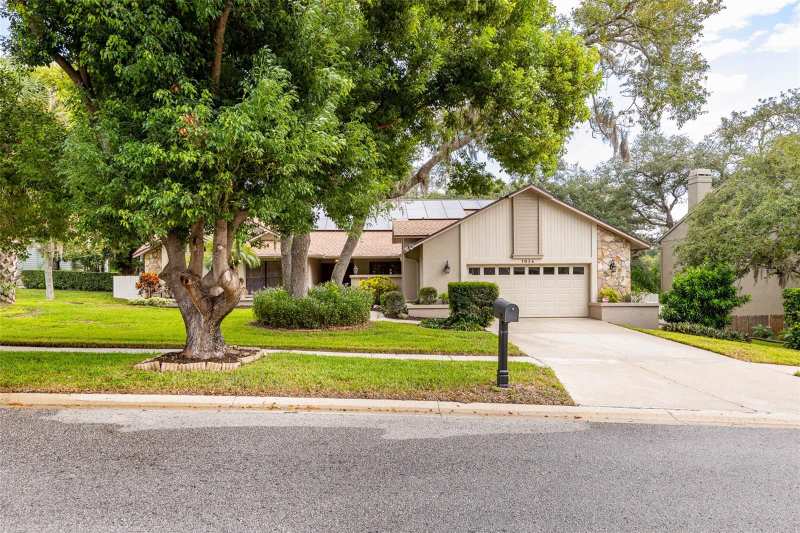 4 bedroom Single Family Residence at 1056 Eniswood Pkwy, Eniswood Unit II A, Palm Harbor — photo 1