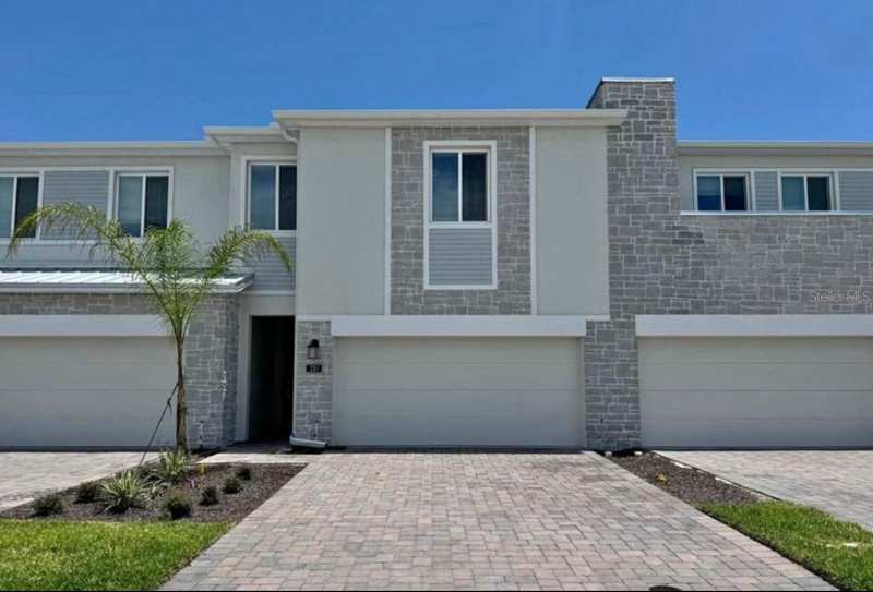 4 bedroom Townhouse at 138 Nine Iron Drive, Tract X, Davenport — photo 1