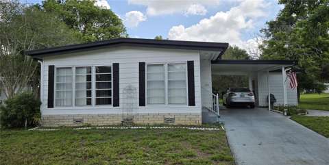 2011 Oak Grove Drive #39, home for sale in Zellwood 32798