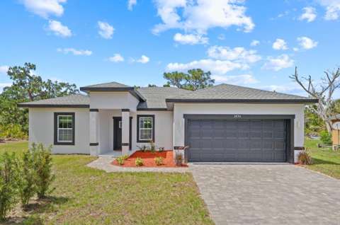 3830 Gardenia Drive, home for sale in Indian Lake Estates 33855
