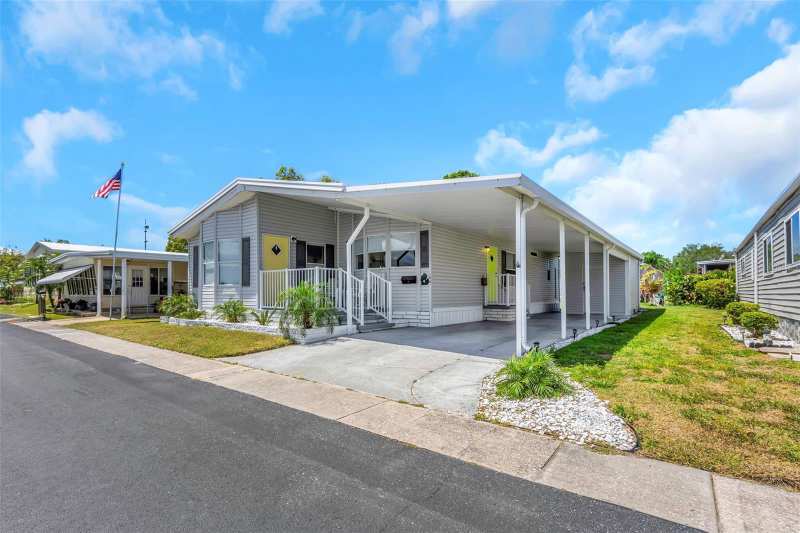2 bedroom Manufactured Home at 106 Thatch Palm Street, Palm Hill Mobile Home Park Unrec, Largo — photo 1