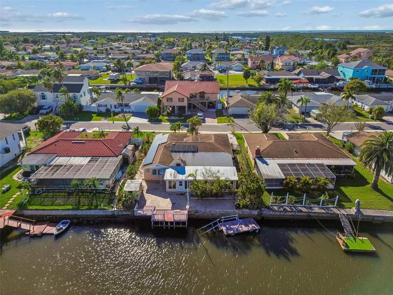 4 bedroom Single Family Residence at 9900 Island Harbor Drive, West Port Sub Unit 4, Port Richey — photo 1