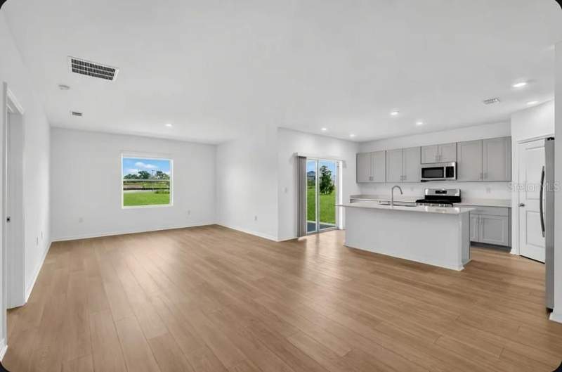 4 bedroom Single Family Residence at 7409 Fieldstone Drive, Waterstone, Groveland — photo 3