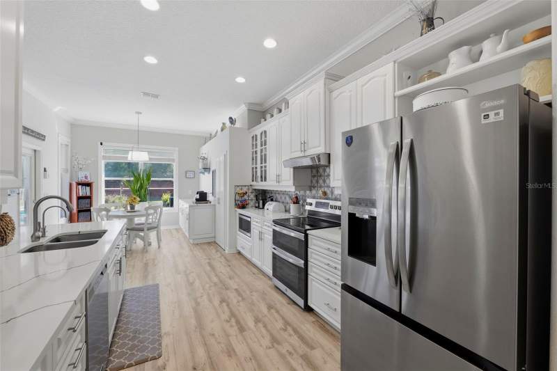 4 bedroom Single Family Residence at 10124 Maybrook Court, Gracewood At River Ridge, New Port Richey — photo 2