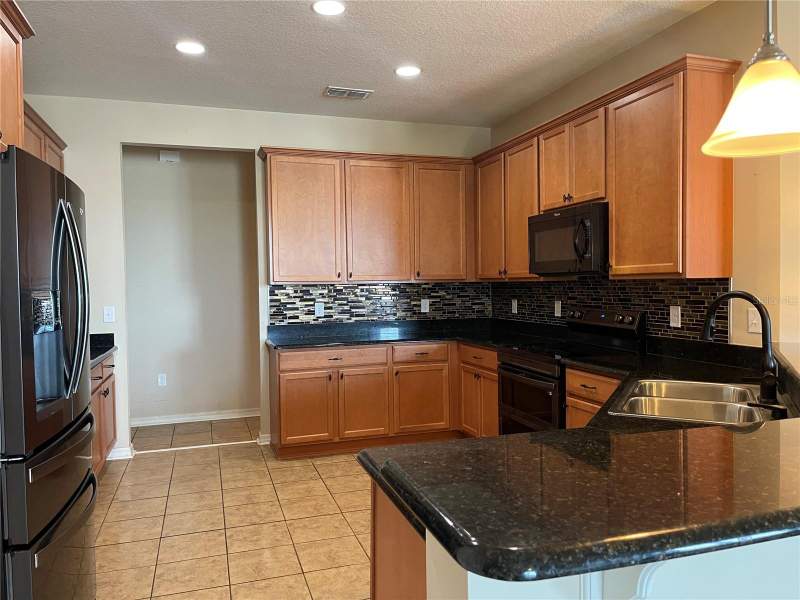 4 bedroom Single Family Residence at 10026 WEATHERS LOOP, HIGHLAND GROVES PH II SUB, CLERMONT — photo 4