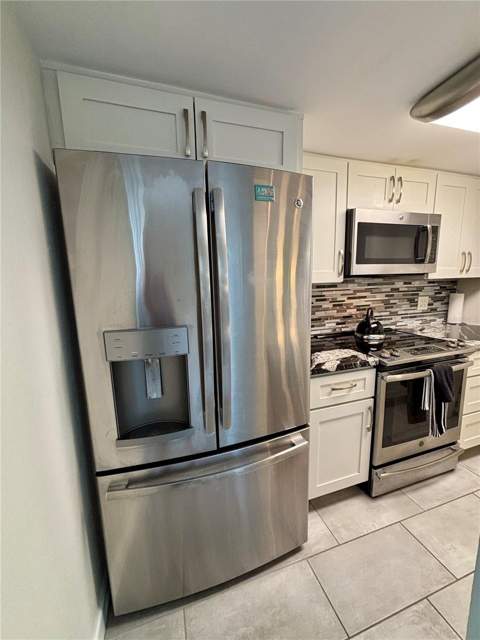 179 Medallion Boulevard #E, Madeira Beach FL - photo 11 of 36