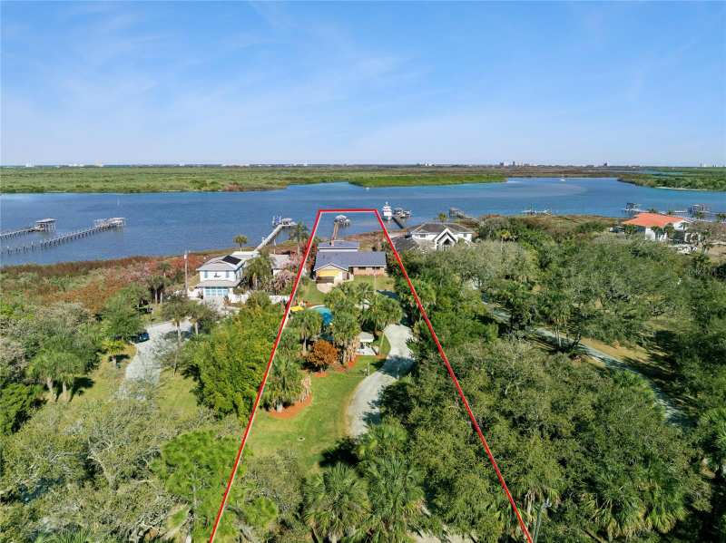 5 bedroom Single Family Residence at 1703 S Riverside Drive, Snider Pickett Grant New Smyrna, New Smyrna Beach — photo 1