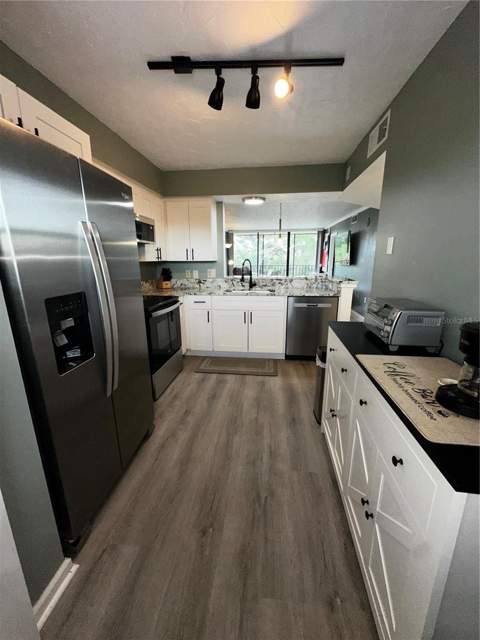 800 Cove Cay Drive #4F, Clearwater FL - photo 6 of 32