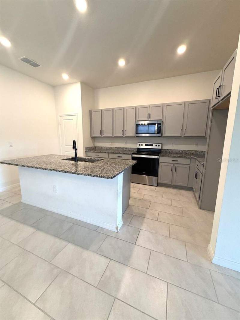 4 bedroom Single Family Residence at 925 Overpool Avenue, Bellaviva Ph 1, Davenport — photo 3