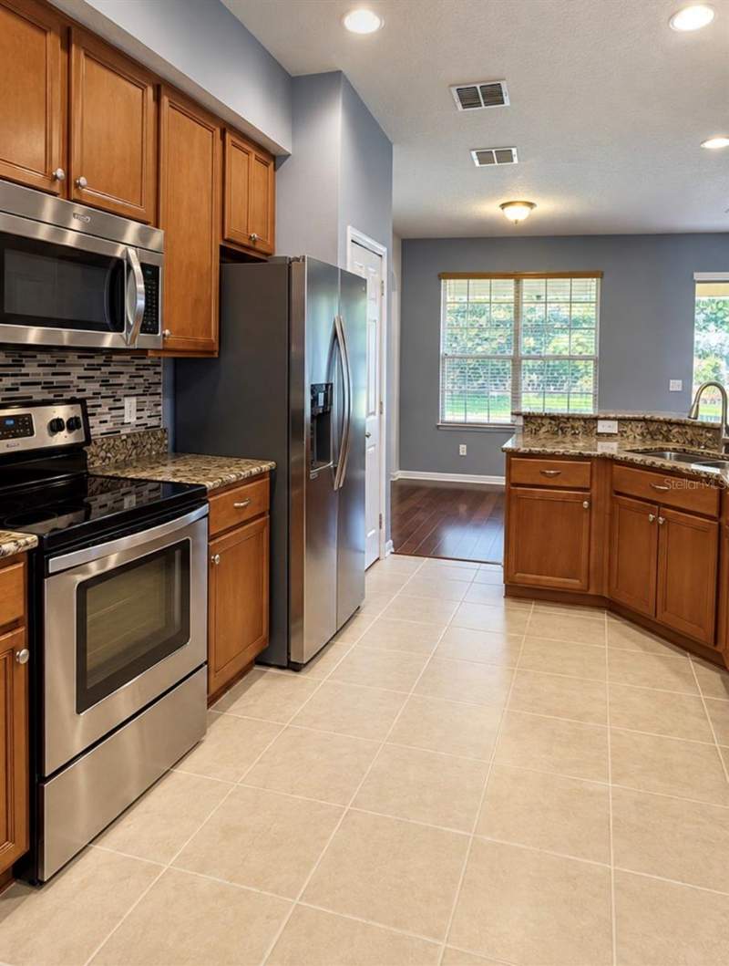4 bedroom Single Family Residence at 7438 Chelsea Harbour Drive, Vista Lakes Vlgs N-16 & N-17 Win, Orlando — photo 5