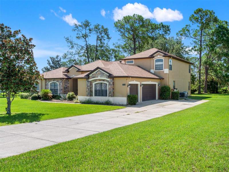 5 bedroom Single Family Residence at 21312 MARSH VIEW COURT, ARROWTREE RESERVE PH II SUB, CLERMONT — photo 2