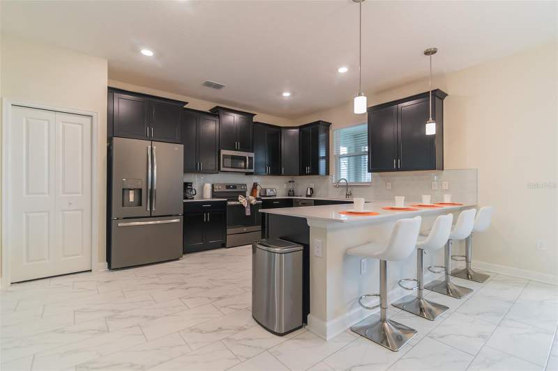 6 bedroom Single Family Residence at 8844 Cabot Cliffs Drive, Stoneybrook South North Prcl Ph 2, Davenport — photo 5
