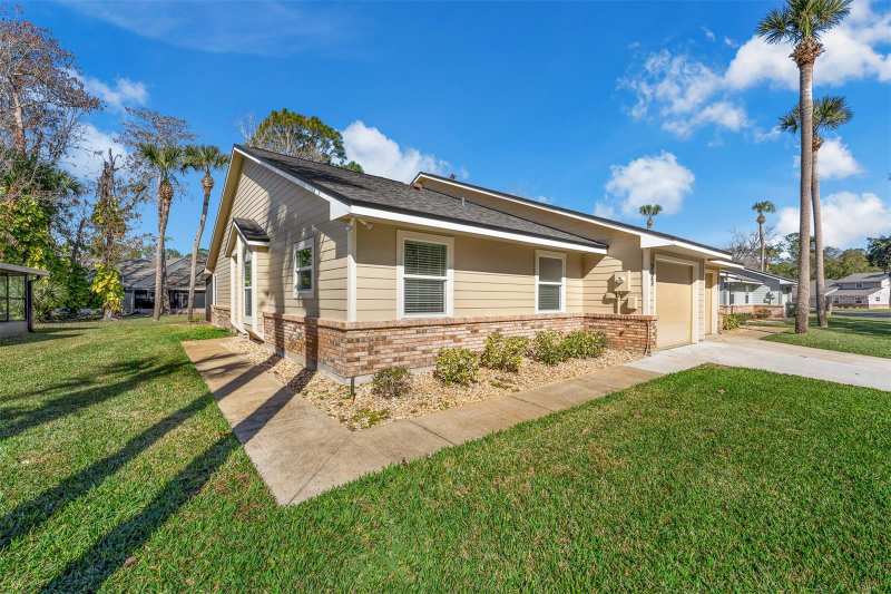 2 bedroom Villa at 233 Bob White Court, Hawks Landing At Pelican Bay Condo Ph 01-06 Amd 01, Daytona Beach — photo 1