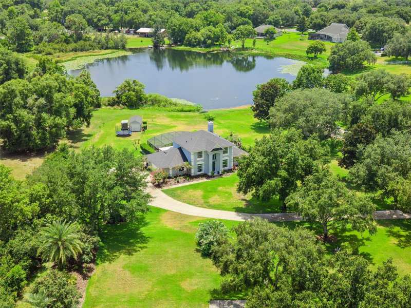 4 bedroom Single Family Residence at 7648 Lake Angelina Drive, Laurels Mount Dora 45/98, Mount Dora — photo 1