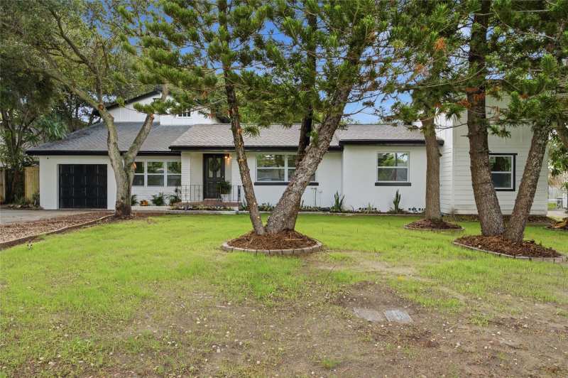 4 bedroom Single Family Residence at 809 Woodcrest Avenue, Oak Acres, Clearwater — photo 1