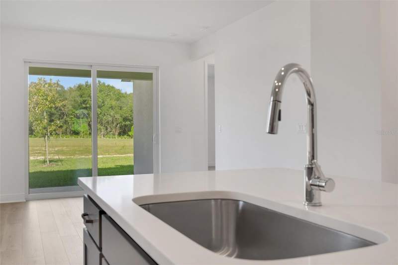 4 bedroom Single Family Residence at 934 Sunshower Drive, Reserves At Hammock Oaks, Lady Lake — photo 5