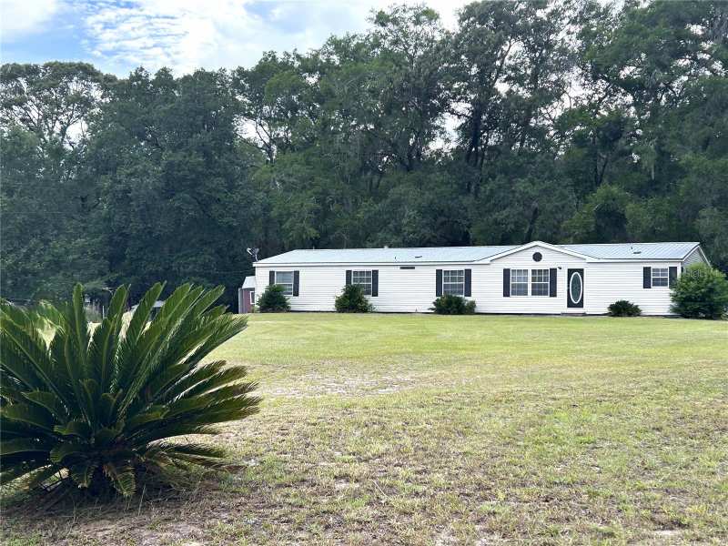 4 bedroom Manufactured Home at 11922 NW 197th Ter, Quail Roost Estates Unrec, Alachua — photo 1
