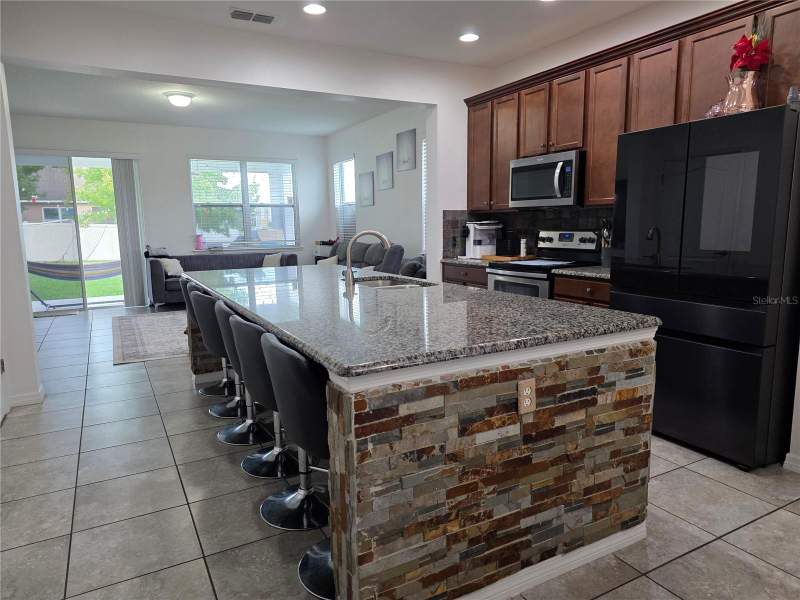 4 bedroom Single Family Residence at 12749 Garridan Avenue, Wickham Park, Windermere — photo 3