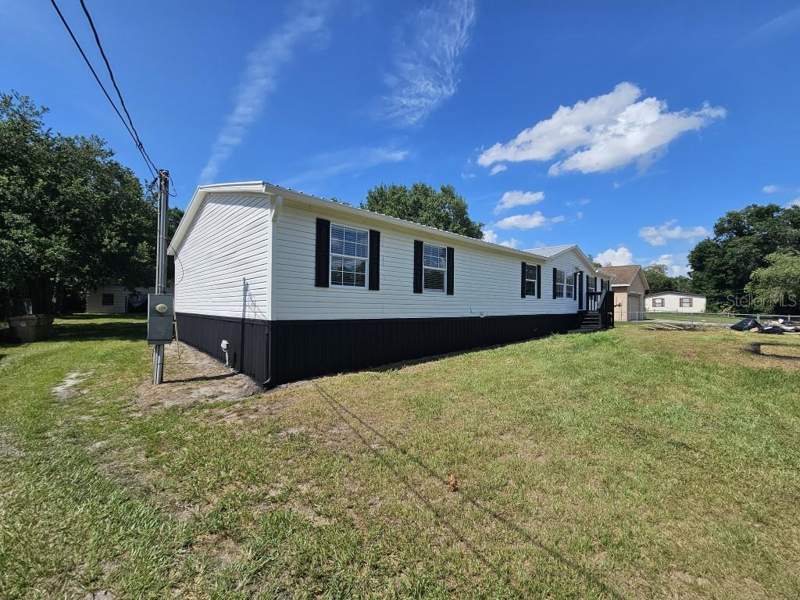 5 bedroom Manufactured Home at 5105 COUNTRYSIDE COURT, COUNTRYSIDE, ST CLOUD — photo 4