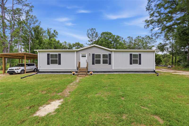 3 bedroom Manufactured Home at 9367 254th Terrace, Oak Hill Farms, O'Brien — photo 1