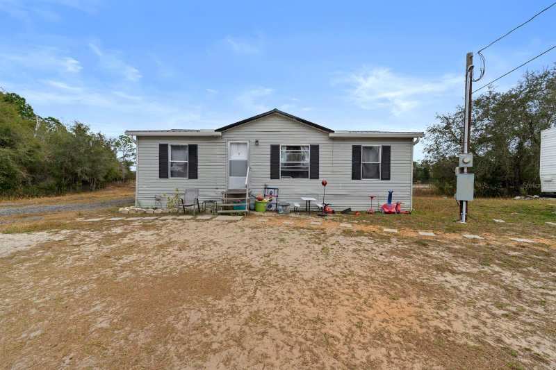 3 bedroom Manufactured Home at 17558 Caufield Road, X, Spring Hill — photo 1