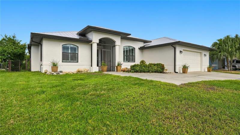 4 bedroom Single Family Residence at 9150 Melody Circle, Port Charlotte Sec 071, Port Charlotte — photo 2