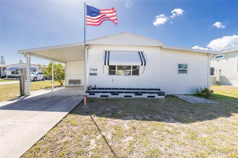 2 bedroom Manufactured Home at 7369 Candace Lane, Village Holiday Lake, Port Charlotte — photo 1