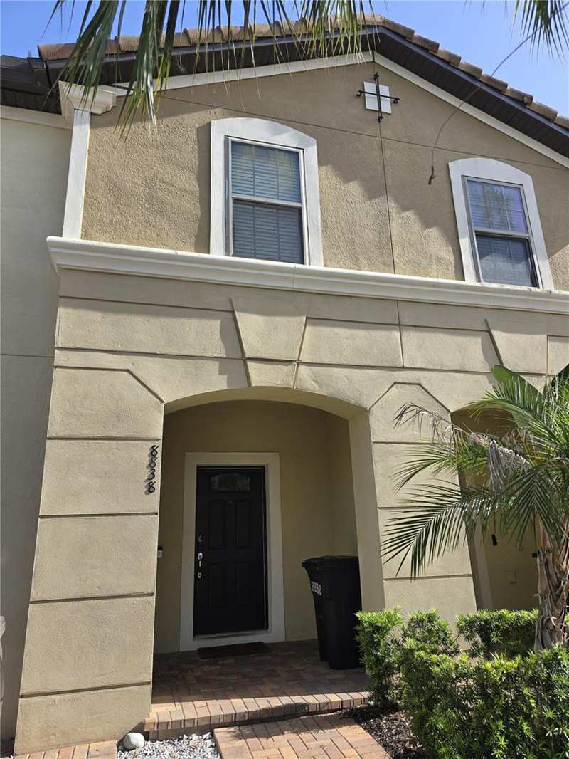 5 bedroom Townhouse at 8838 Geneve Court, Windsor At Westside Ph 2B, Kissimmee — photo 1