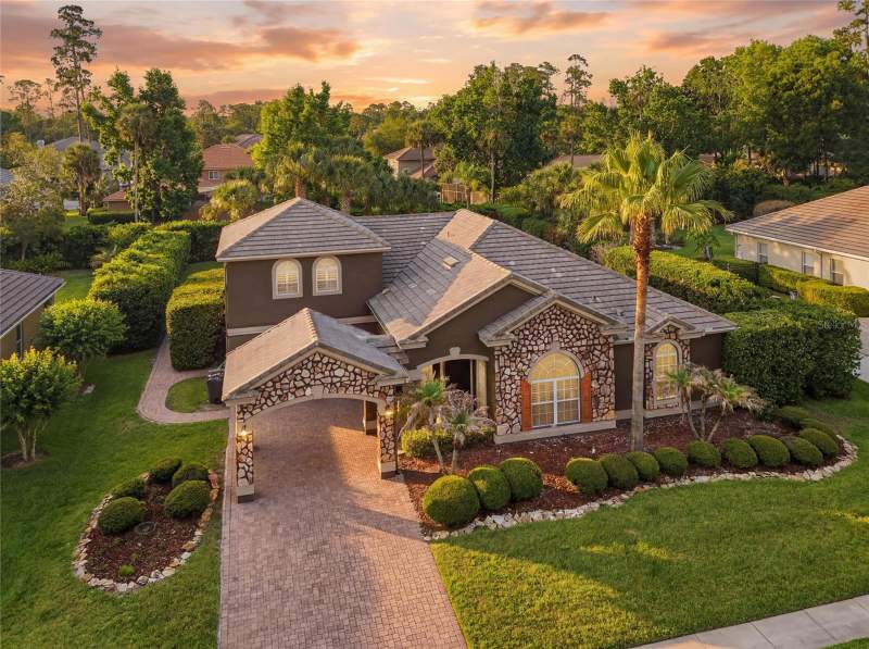 6 bedroom Single Family Residence at 1707 COTTONWOOD CREEK PLACE, MAGNOLIA PLANTATION, LAKE MARY — photo 1
