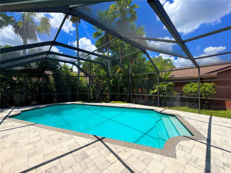 4 bedroom Single Family Residence at 588 Hollowtree Place, Oaklake Village At Woodfield Ph II, Tarpon Springs — photo 3