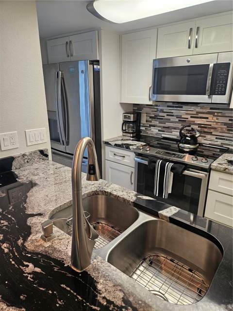 179 Medallion Boulevard #E, Madeira Beach FL - photo 10 of 36