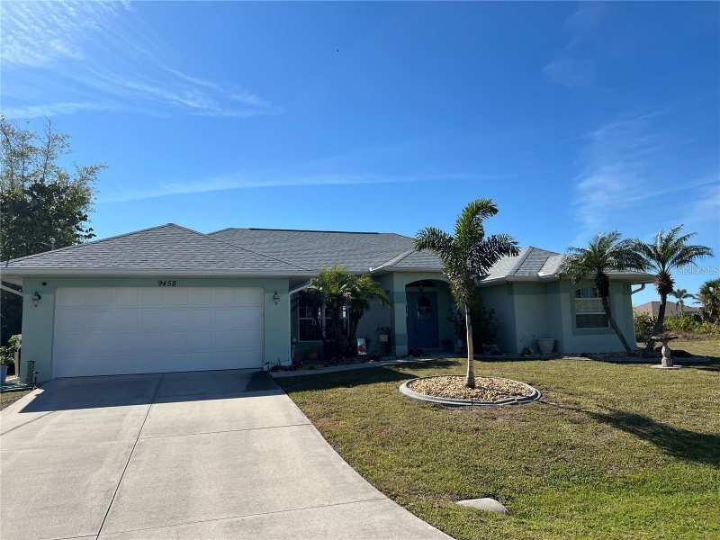 4 bedroom Single Family Residence at 9458 Melody Circle, Port Charlotte Sec 71, Port Charlotte — photo 1