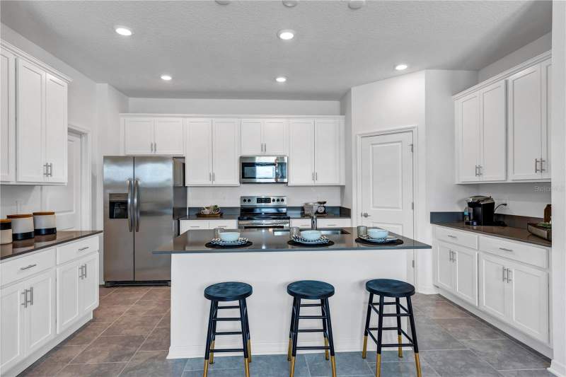 4 bedroom Single Family Residence at 3341 Addison Boulevard, Springhead Lakes 50S, St Cloud — photo 2