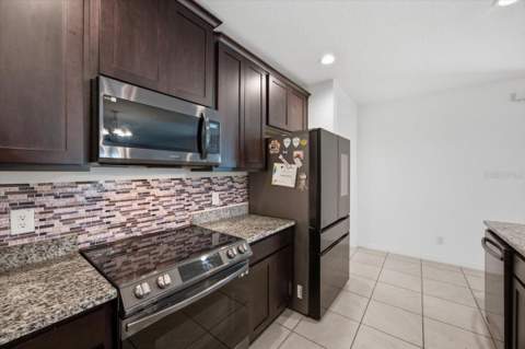 5049 Blue Hammock Court, Kissimmee FL - photo 7 of 35