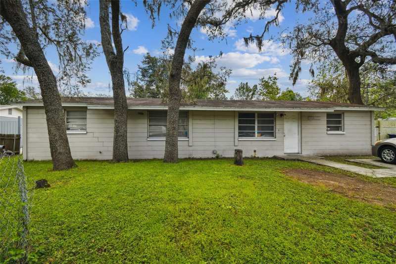 4 bedroom Single Family Residence at 10101 N 11th Street, Castle Heights Map, Tampa — photo 1