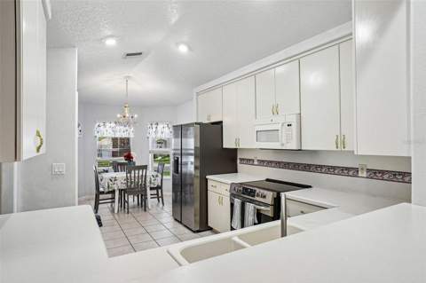 5964 Brittania Boulevard, Tavares FL - photo 9 of 37