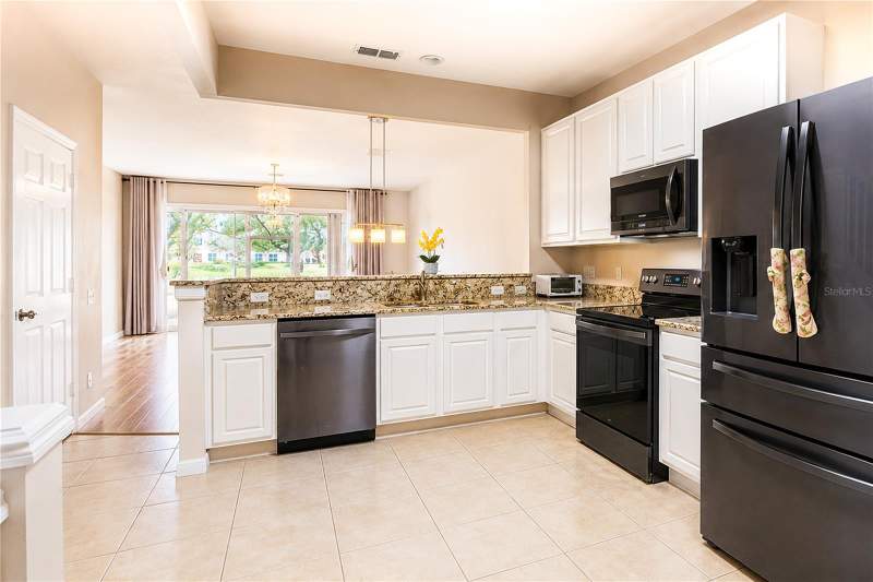 2 bedroom Townhouse at 6059 TWAIN STREET #103, VISTAS/STONEBRIDGE PLACE, ORLANDO — photo 4