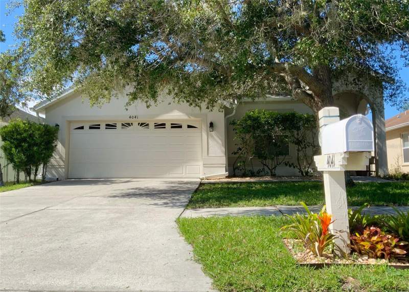4 bedroom Single Family Residence at 4041 Langdrum Drive, Meadow Pointe 4 B-1 C-1-C-3, Wesley Chapel — photo 2