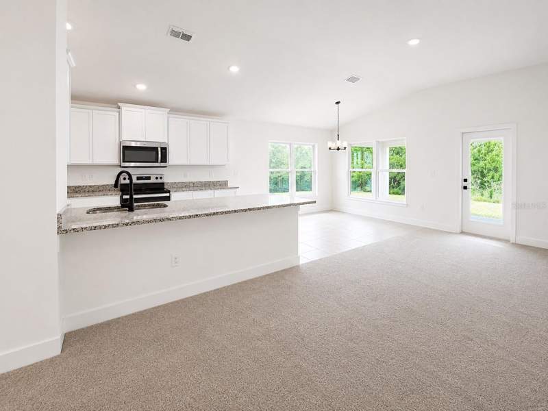 3 bedroom Single Family Residence at 7618 BENT TREE LOOP, HARMONY CENTRAL PH 2, HARMONY — photo 4
