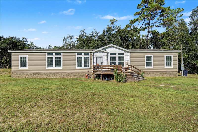 4 bedroom Manufactured Home at 30436 Calle Lane, Williams Acres, Wesley Chapel — photo 1
