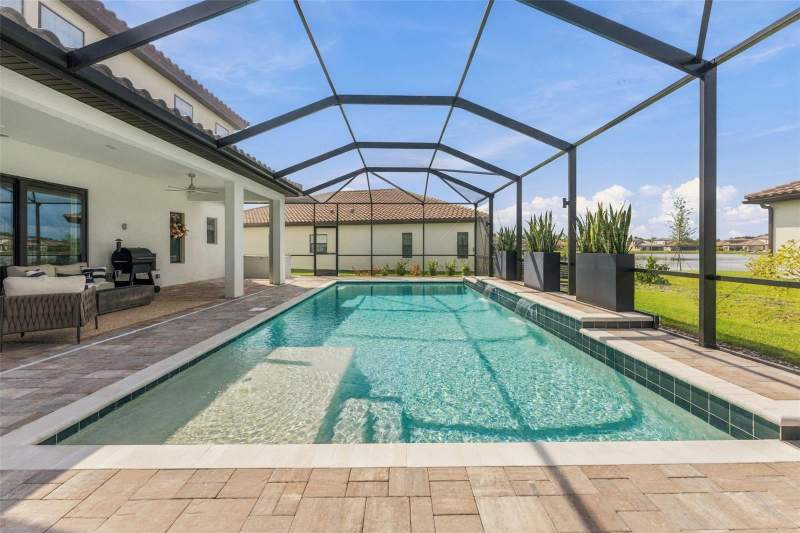 5 bedroom Single Family Residence at 14985 Rider Pass Drive, Hinton Hawkstone Ph 2B1, Lithia — photo 3