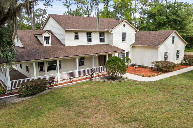 5 bedroom Single Family Residence at 27012 Grand Oak Lane, Beauclair Ranch Club Sub, Tavares — photo 2